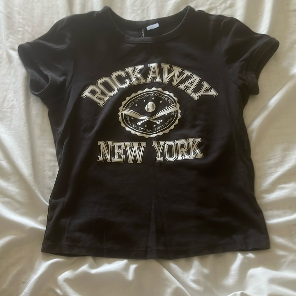 Black slight crop rock away New York baseball
